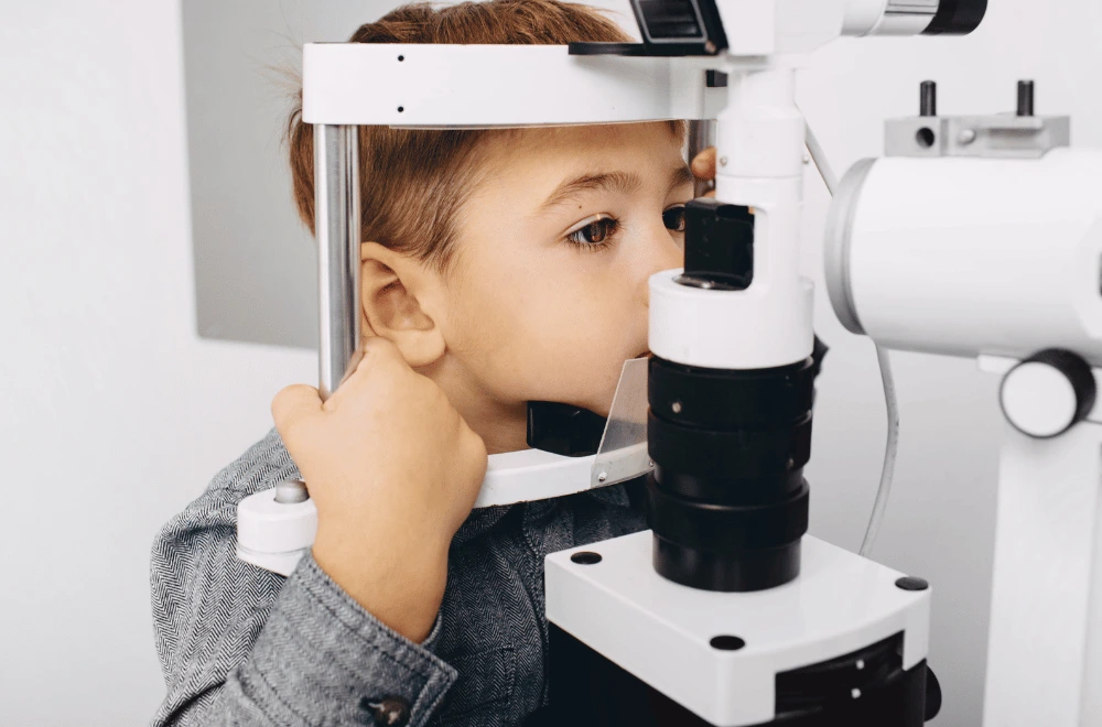a little boy getting a back-to-school eye exam